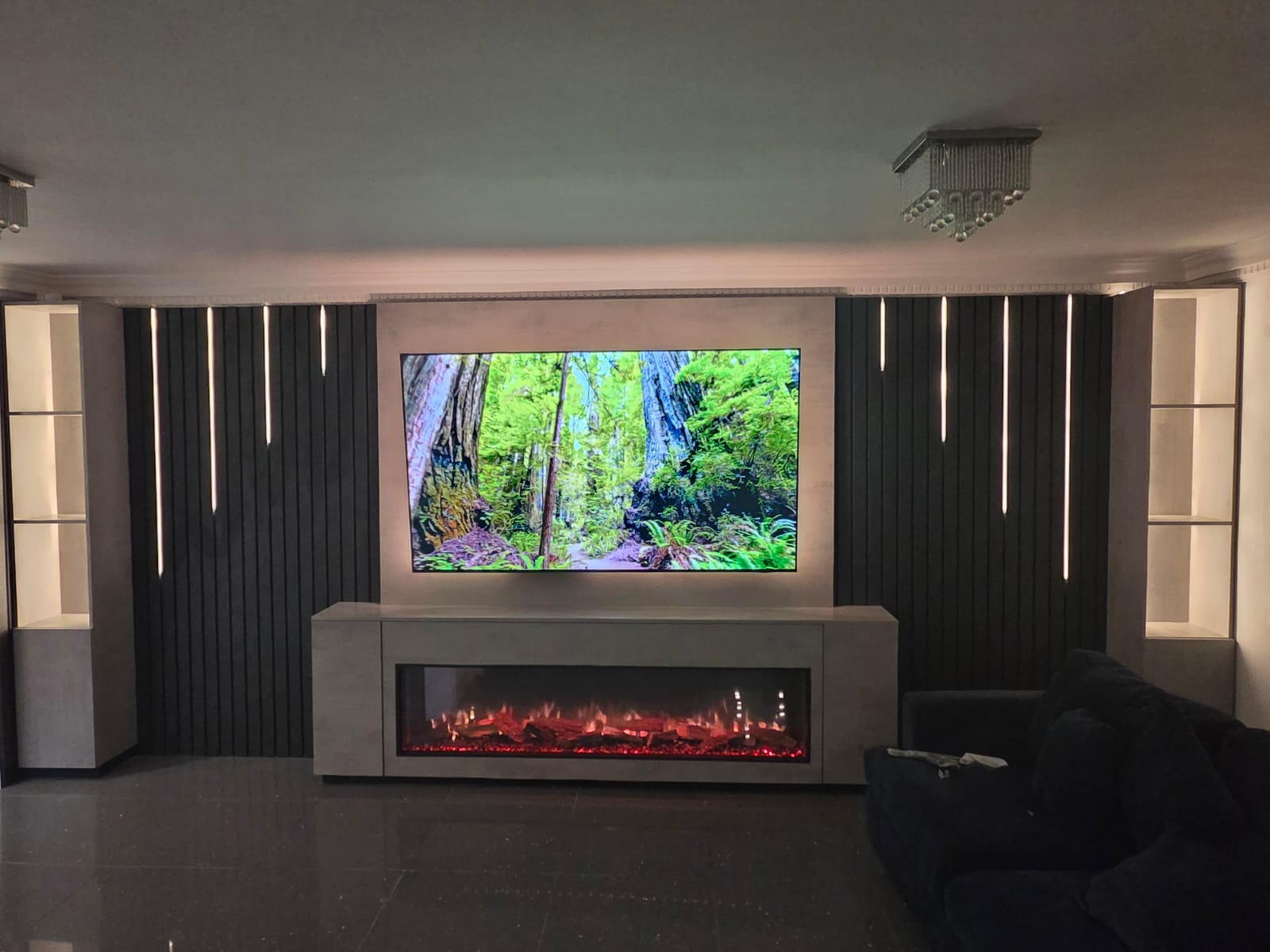 The Bespoke Bruce Media Wall bespoke media wall — designed, built and installed across Scotland by West Lothian Feature Walls